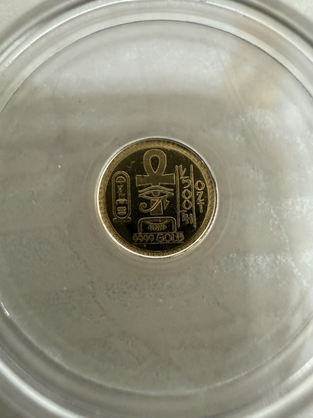 Beautiful 1/500 oz Monarch Egyptian Eye of Ra .9999 Fine Gold Round BU Capsule