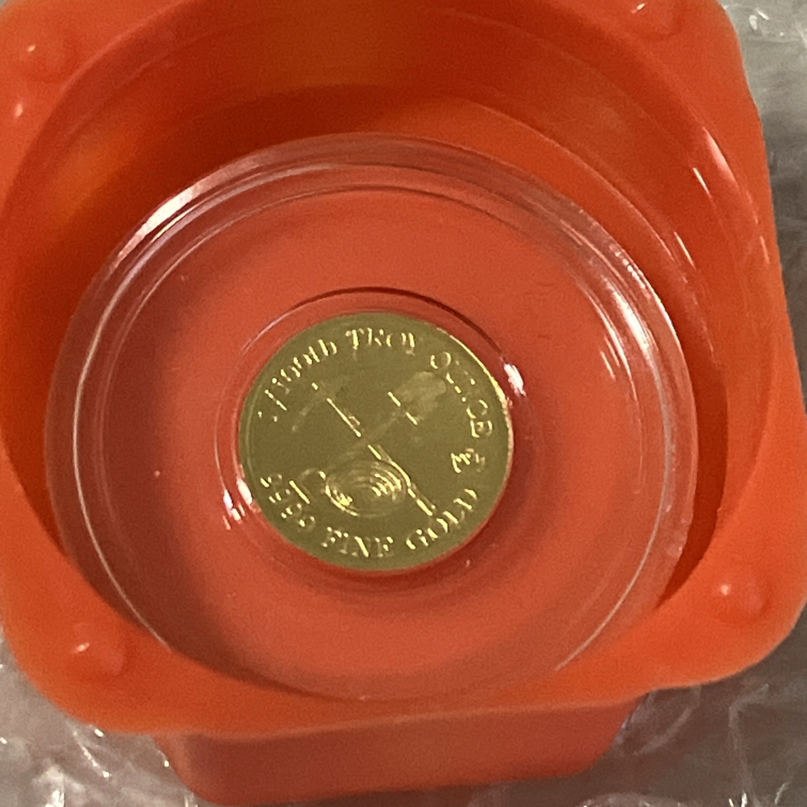 1/100th Troy ounce MONARCH .9999 Fine Gold Prospector Round in Clear Capsule
