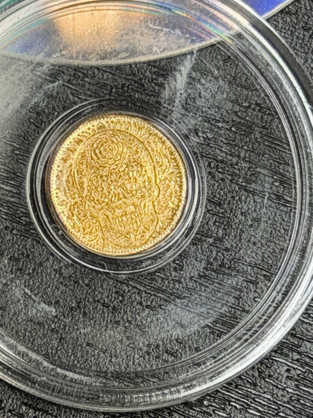 1/200 OZ MONARCH DAY OF THE DEAD .9999 FINE GOLD ROUND IN SEALED CAPSULE
