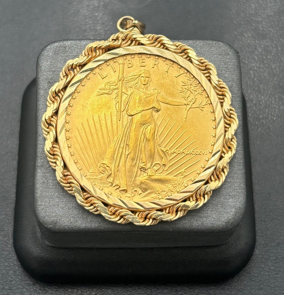 1986 P 1ozt. American Eagle Coin & 14kt Rope Style Bezel/Pendant with 5mm Bale