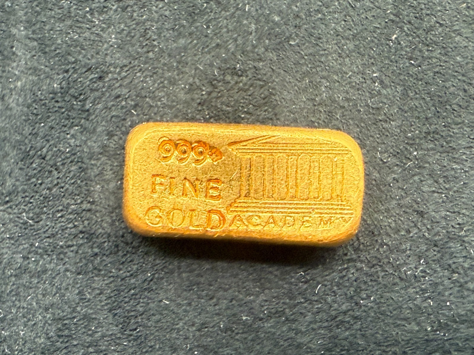 1 oz Gold Bar – Academy Mint – Cast 999 Fine