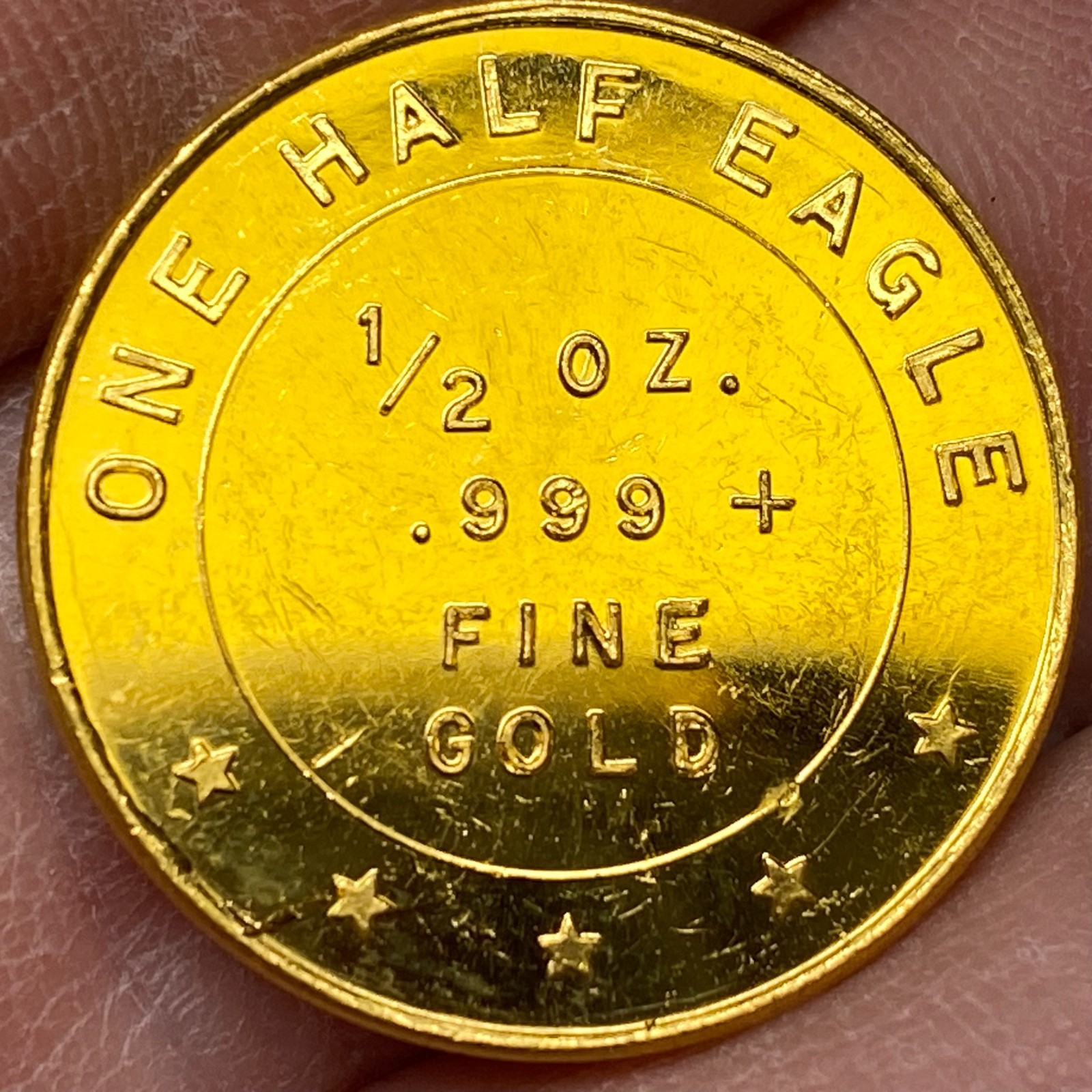 AMERICAN EAGLE WHITLEY MINT 1/2 OZ EAGLE .999 FINE GOLD ROUND