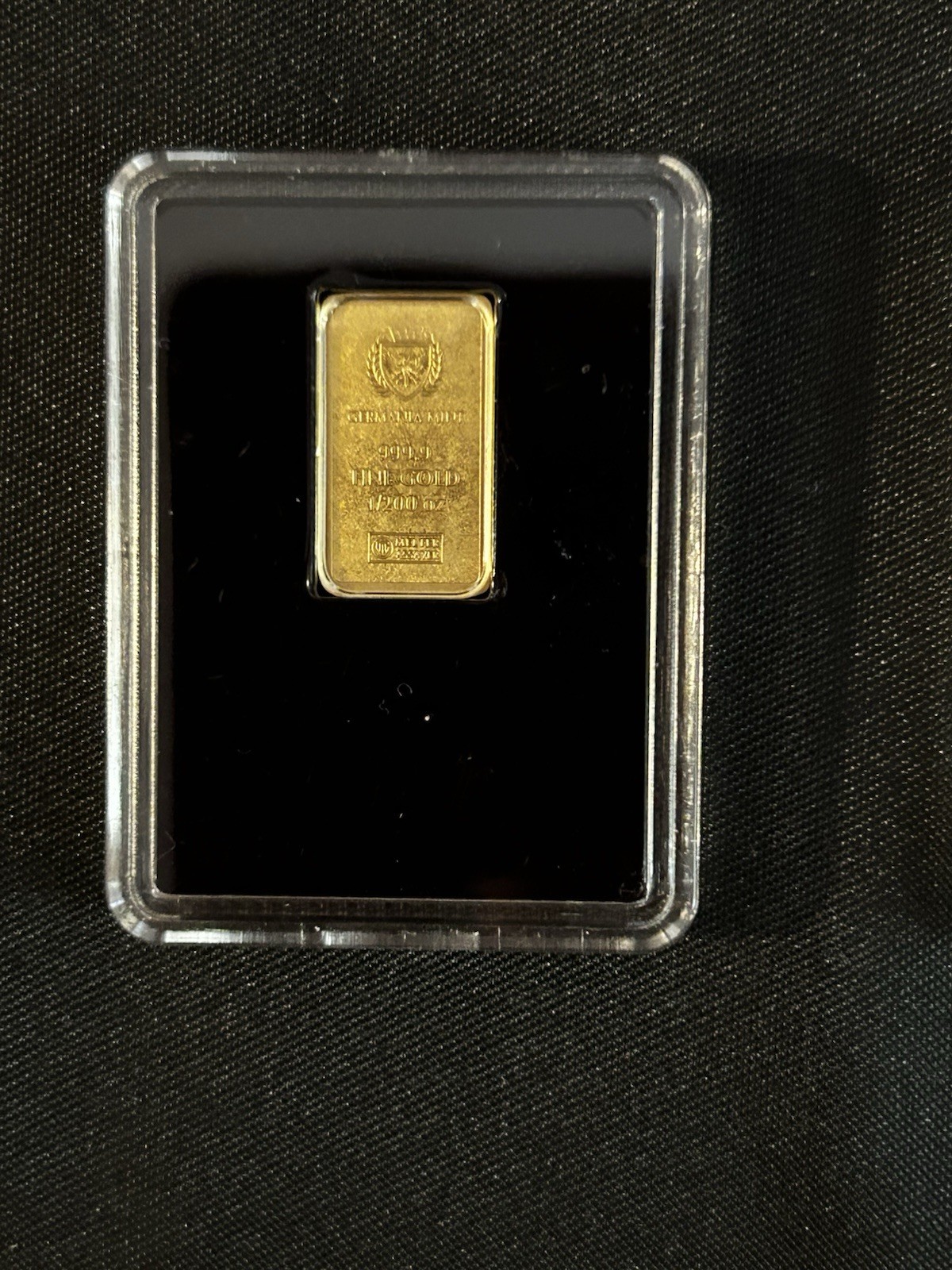 Lot of 2, 1/200th oz Germania Mint Gold In Capsules