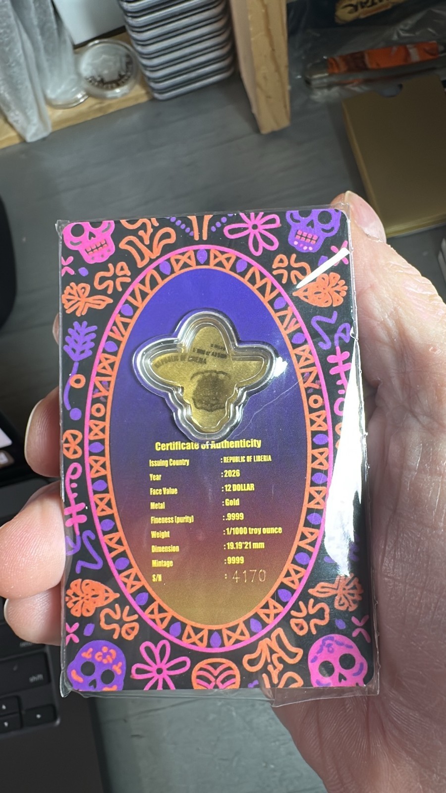 2026 Liberia 1/1000th Gold Carded Dia De Los Muertos Special Shaped with Capsule