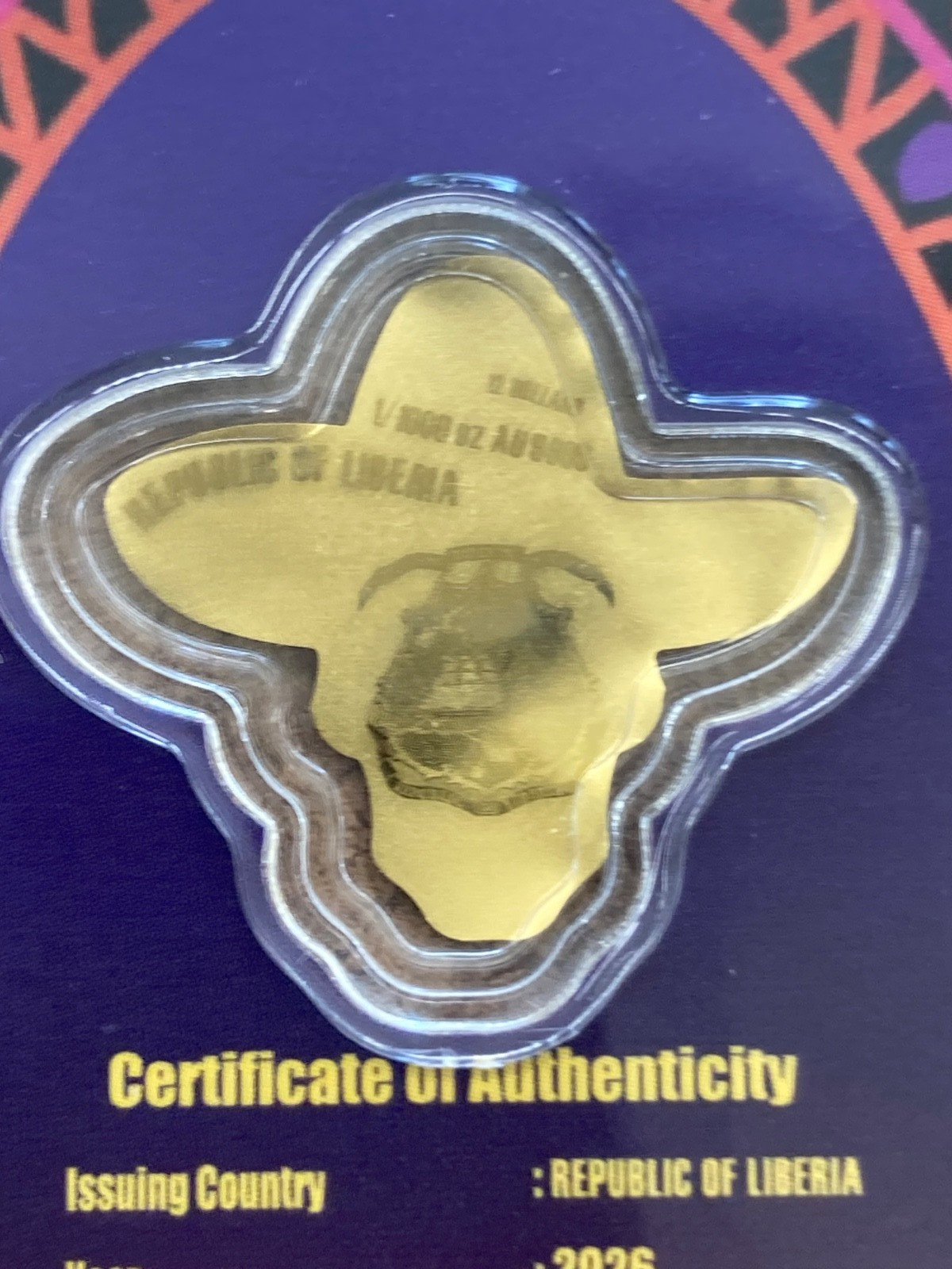 2026 Liberia 1/1000th Gold Carded Dia De Los Muertos Special Shaped with Capsule