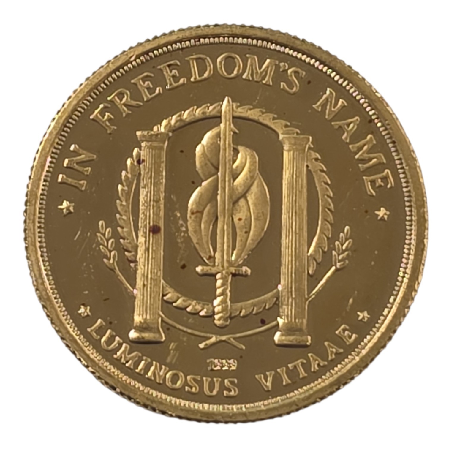 1 oz Gold Avalon The Patriot Round with Red Spots and Minor Scratches
