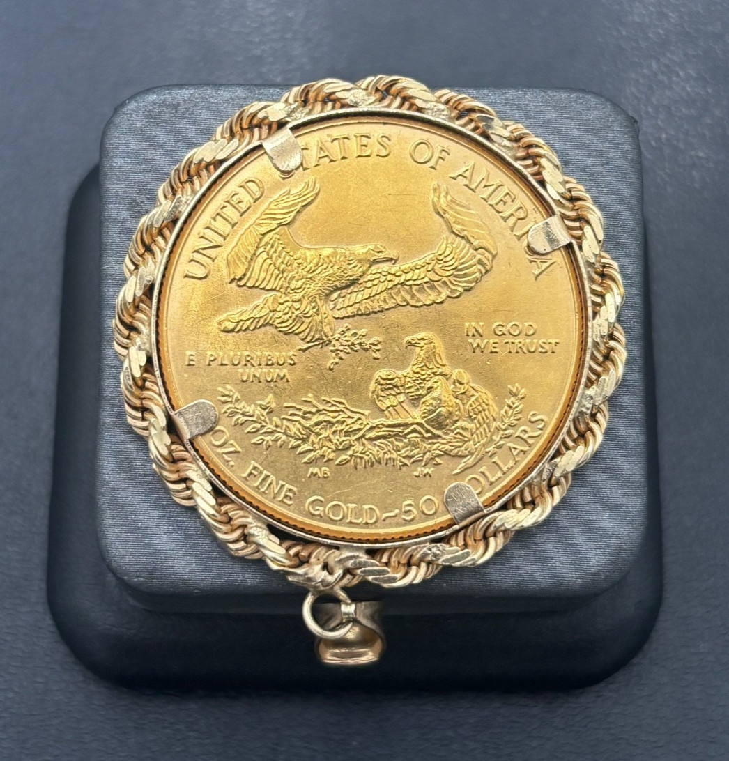1986 P 1ozt. American Eagle Coin & 14kt Rope Style Bezel/Pendant with 5mm Bale