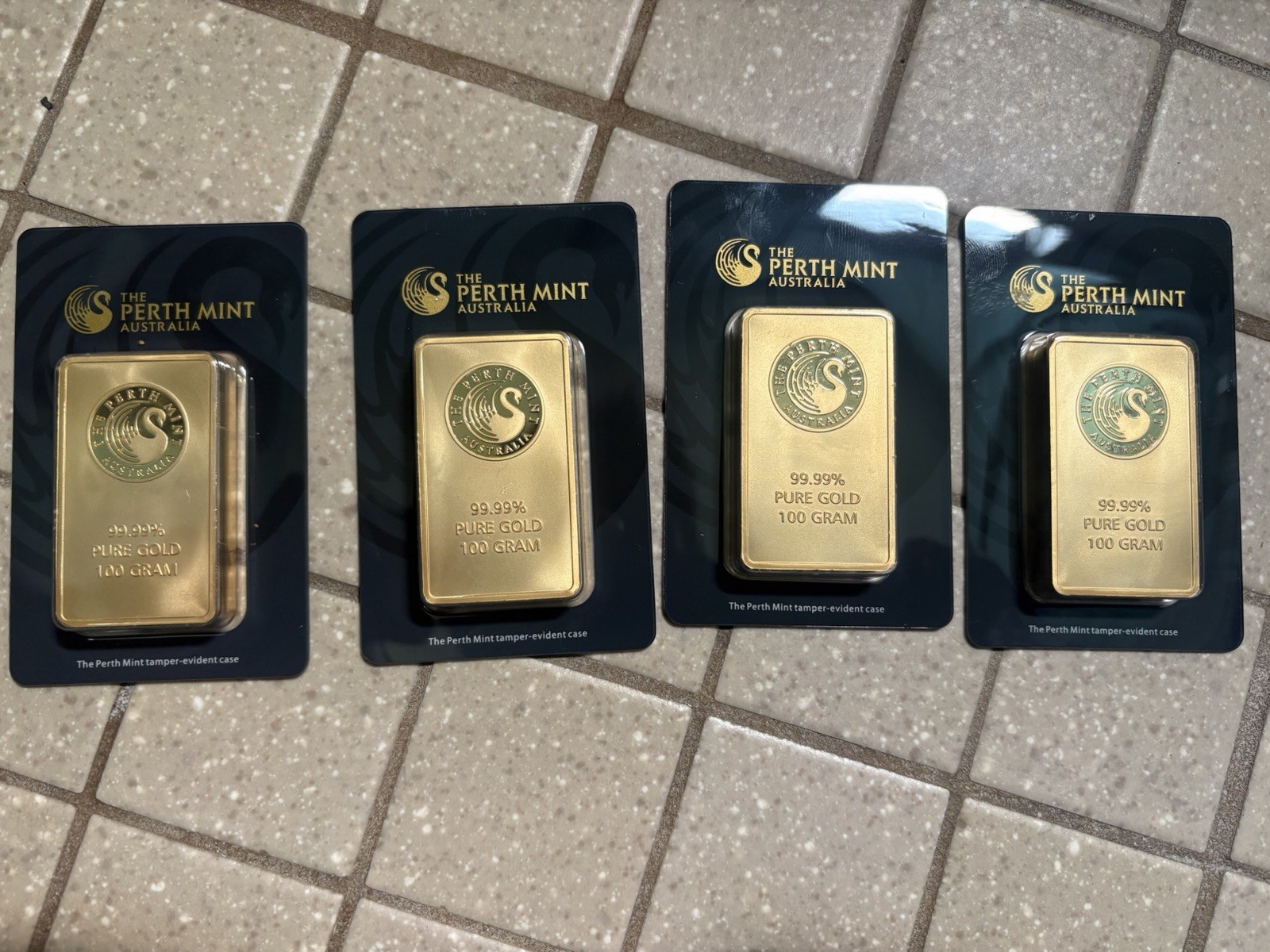 The Perth Mint 100g .9999 Fine Gold Bar in Assay (Lot of 4, 400g)