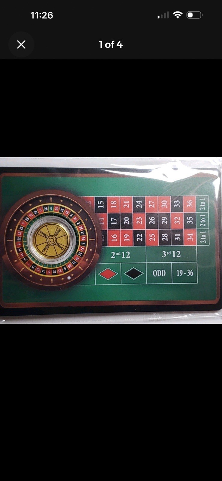 Roulette 1/1000 oz Gold Round In Card. Mintage 10,000