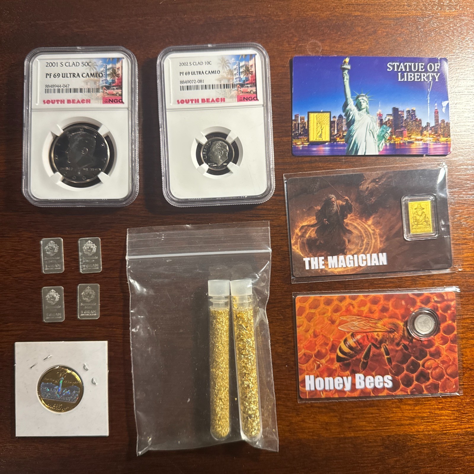 Mixed Lot of Gold, Scottsdale Mint Silver, Platinum, NGC Coins