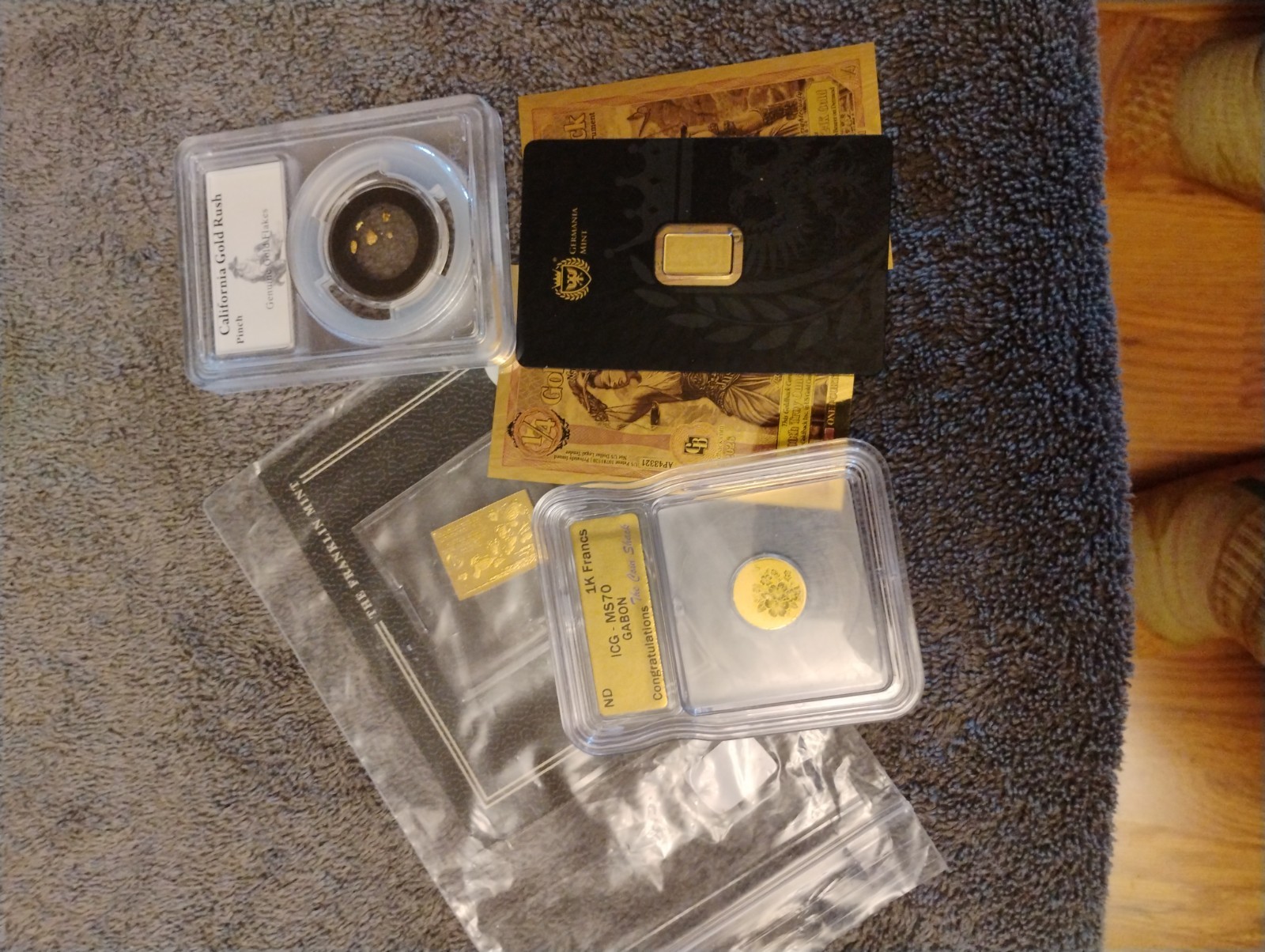 Assorted Gold Pieces With Germania Mint Bar