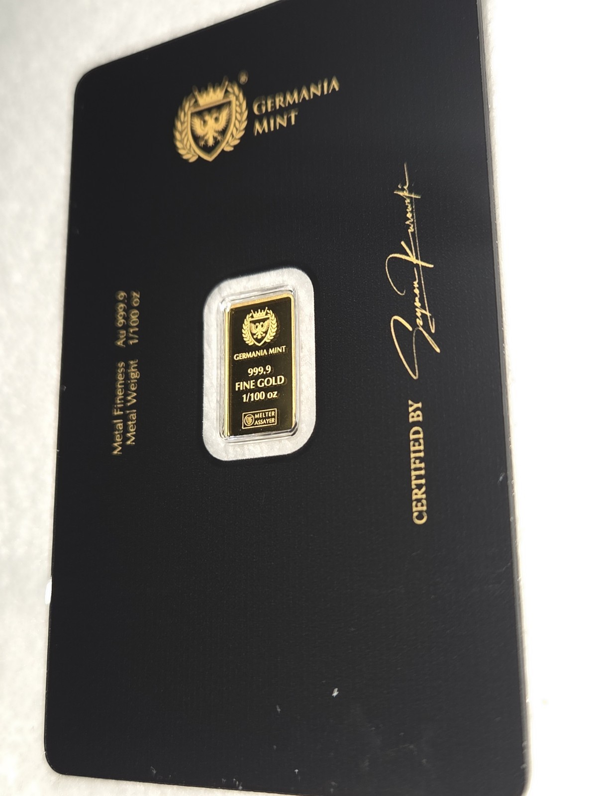 Germania Mint 1/100 Gold Lady Germania Stamped Proof Bar in Card