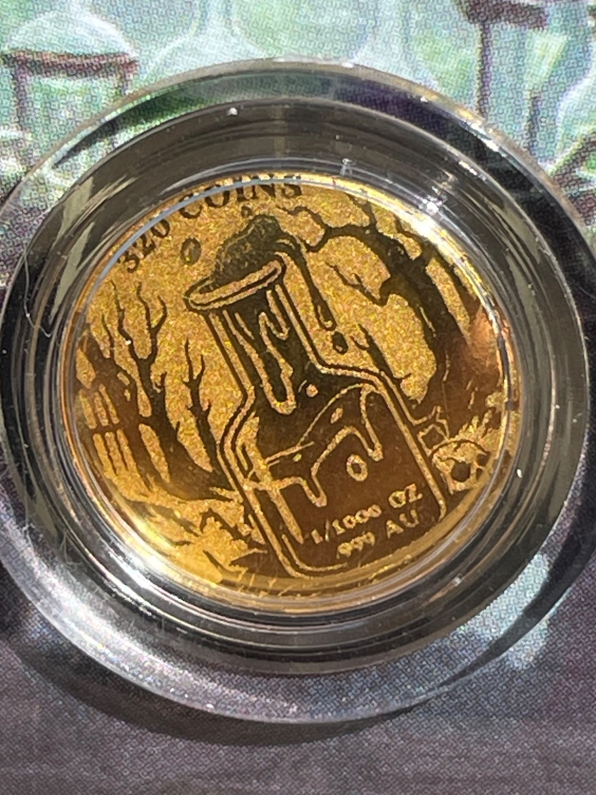 Jekyll & Hyde Gold 1/1000 Oz 999 Fine Round in Card Bullion Limited
