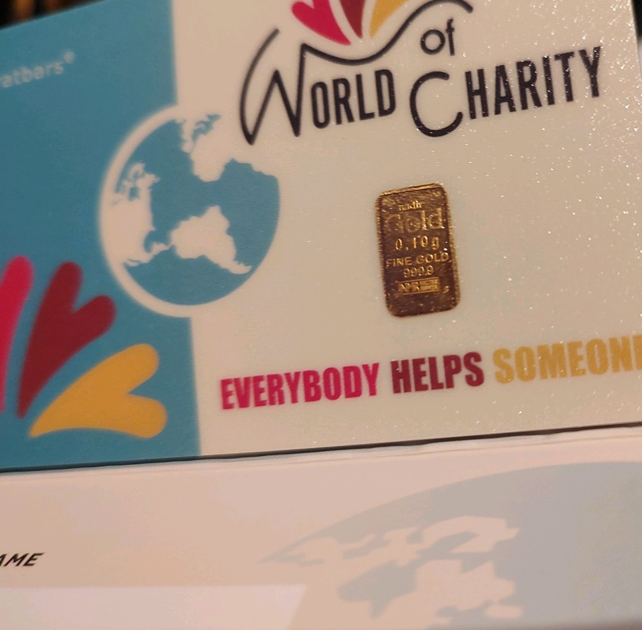 Karetbar .999 Fine Gold 0.10gram Sealed Bar World Charity Everyone Helps Someone