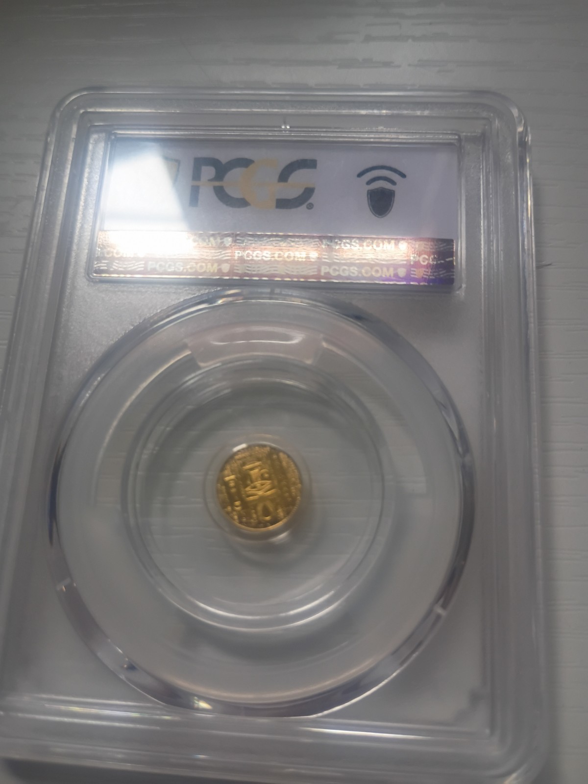 1/200 oz Fine Gold Scarab PCGS Almost Uncirculated 24K Gold Round