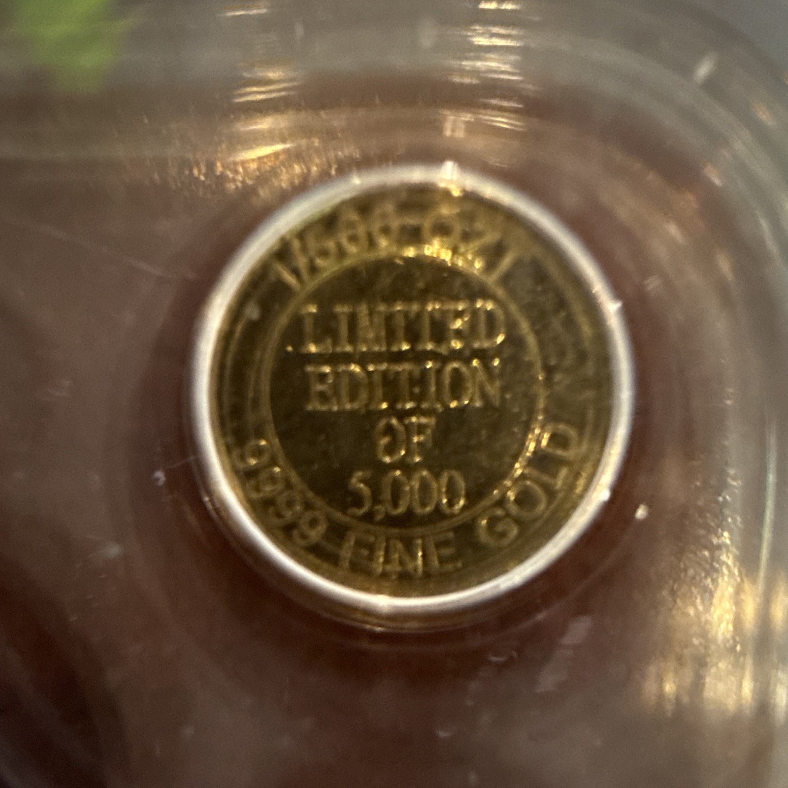 ICG MS70 Colosseum ND 1/500th oz Gold Round Total Gold Content