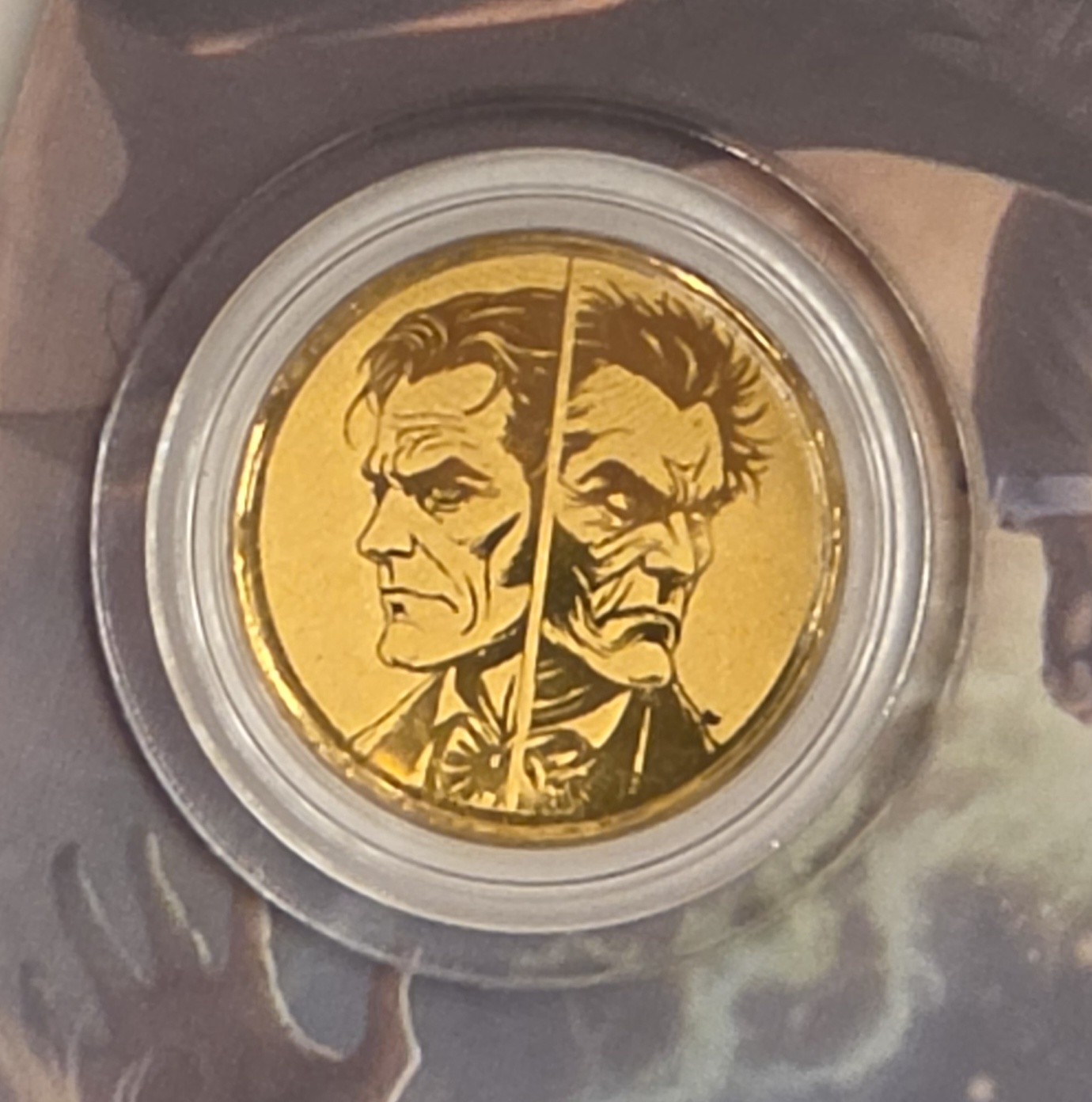 Jekyll & Hyde Gold 1/1000 Oz 999 Fine Round in Card Bullion Limited