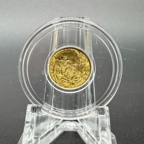 A 1/100 OZ MONARCH .9999 FINE GOLD PROSPECTOR ROUND IN CAPSULE BU