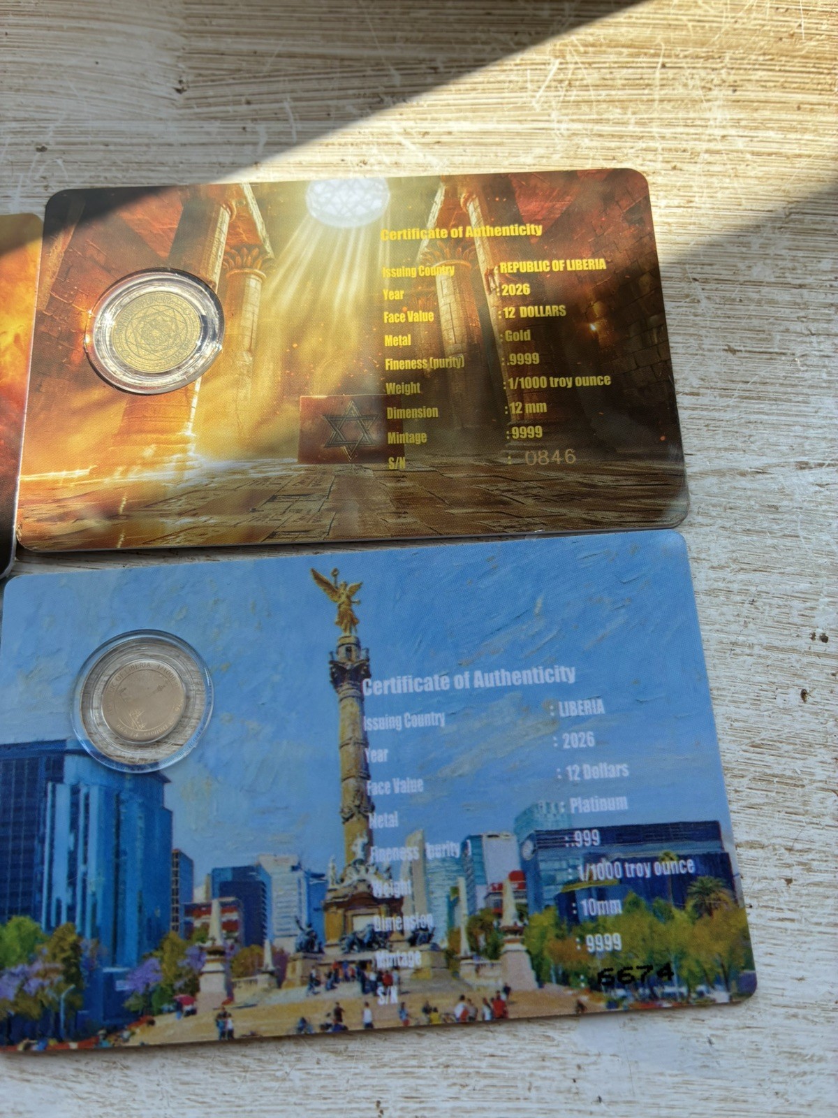 bundle 4x 1/1000th oz fractional gold, 1x silver, 1xPlatinum coin Zeus Brit