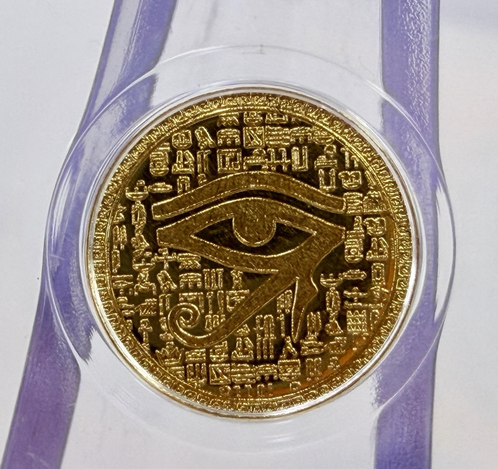 1/500 oz Egyptian Eye of Ra .9999 Fine Gold Round in Capsule Fractional Gold MPM