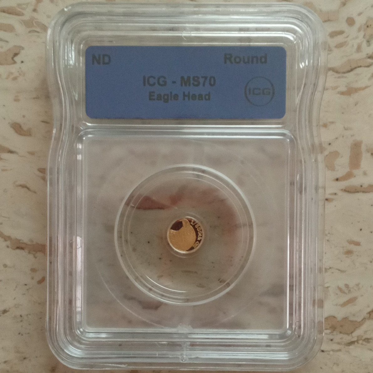 ICG MS70 Eagle Head Gold Round 1/1000 oz Slabbed Gold Round
