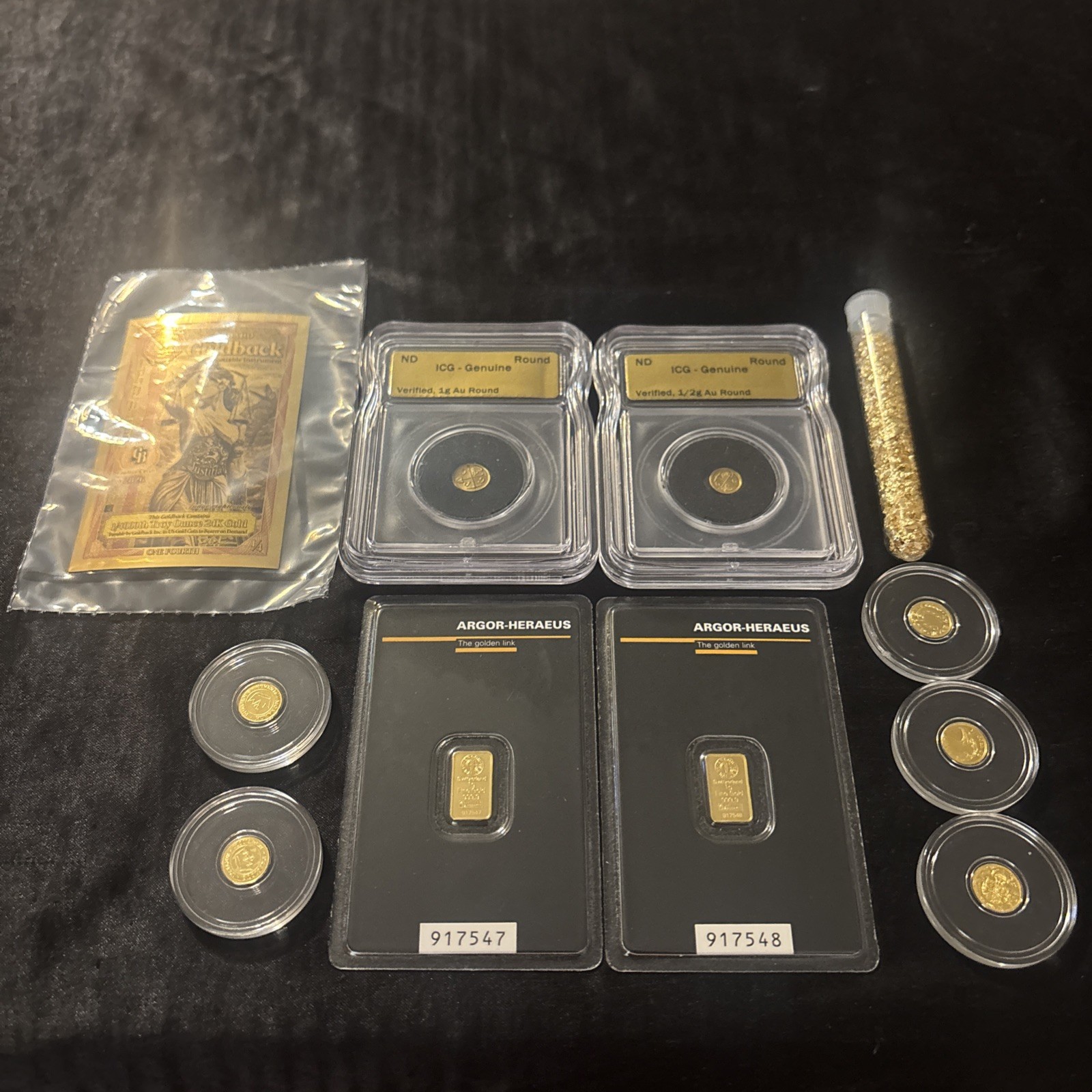 Gold rounds lot with slabs and vial with 1/4 goldback