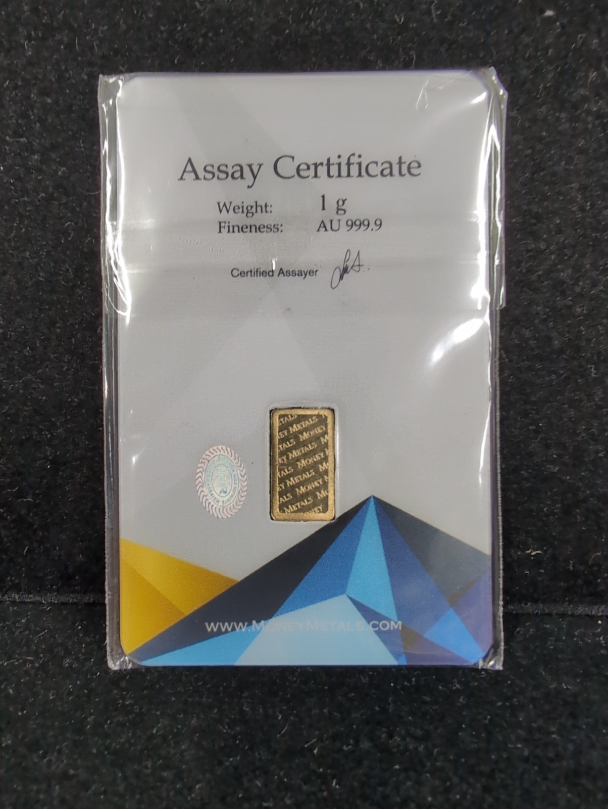 Money Metals 1 gram .9999 fine Gold Bar in Assay