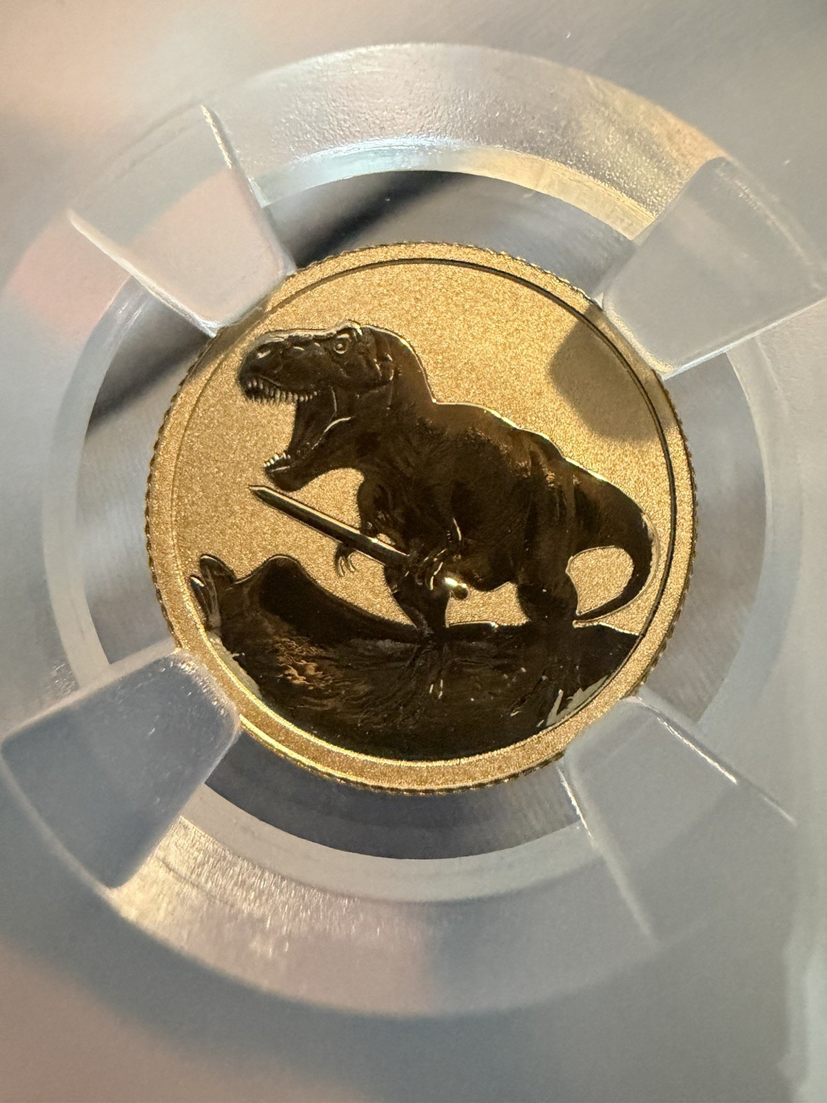 2026 Niue G$2 Gold Tyrannosaurus Rex Holding Sword 2 Gram Gold REVERSE PF 70