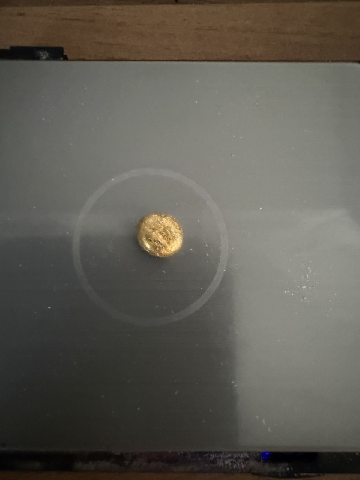 Refined gold button 2.14g