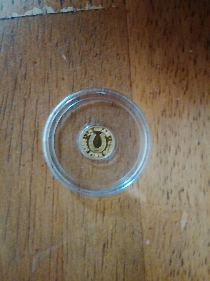 lot of 12. 1/4 GRAM .9999 FINE GOLD ROUNDS IN CAPSULES