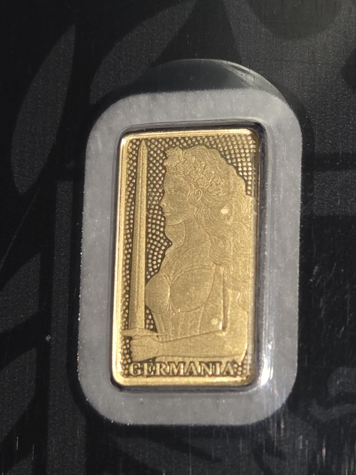 Germania Mint 1/100 Gold Lady Germania Stamped Proof Bar in Card