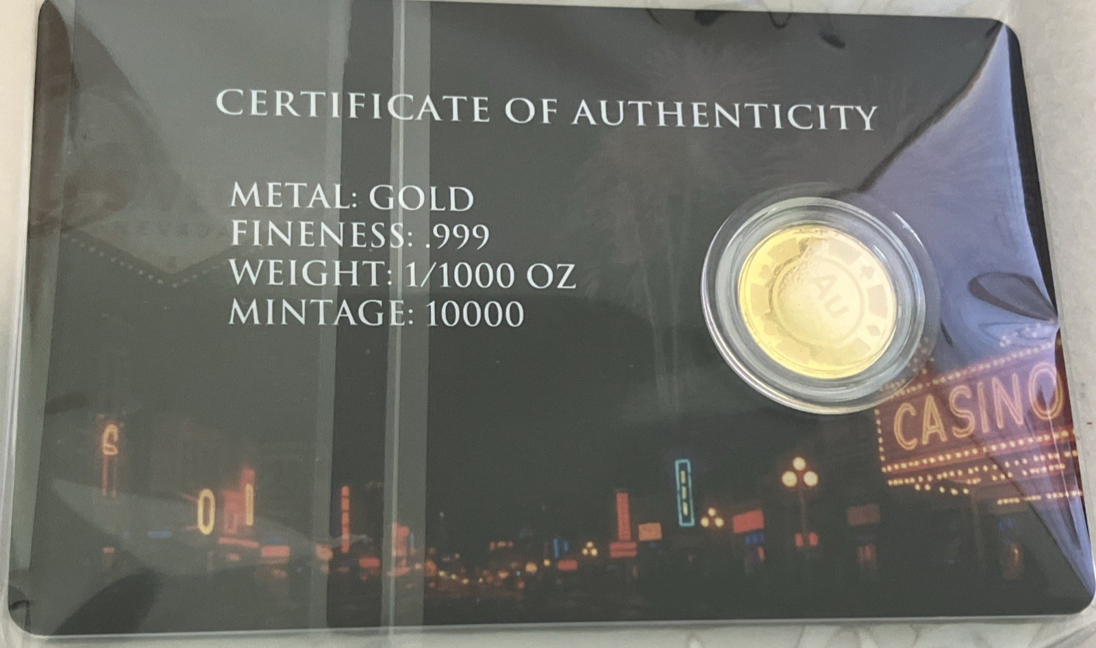 Roulette 1/1000 oz .999 Fine Gold Au Coin in capsule in Card COA Mintage 10,000
