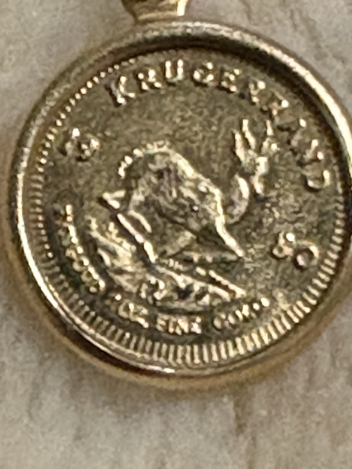 14kt Gold Mini Krugerrand in bezel, International Monetary Mint, 1980