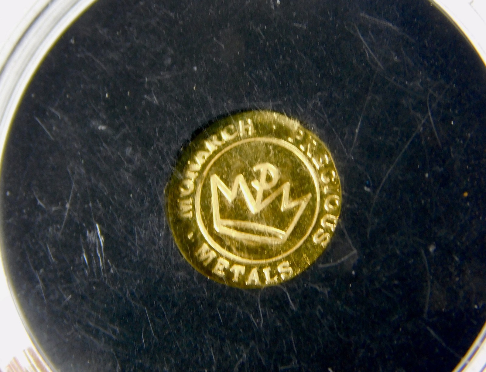 Monarch Precious Metals 1/4 Gram .9999 Fine Gold Lucky Horseshoe Round B