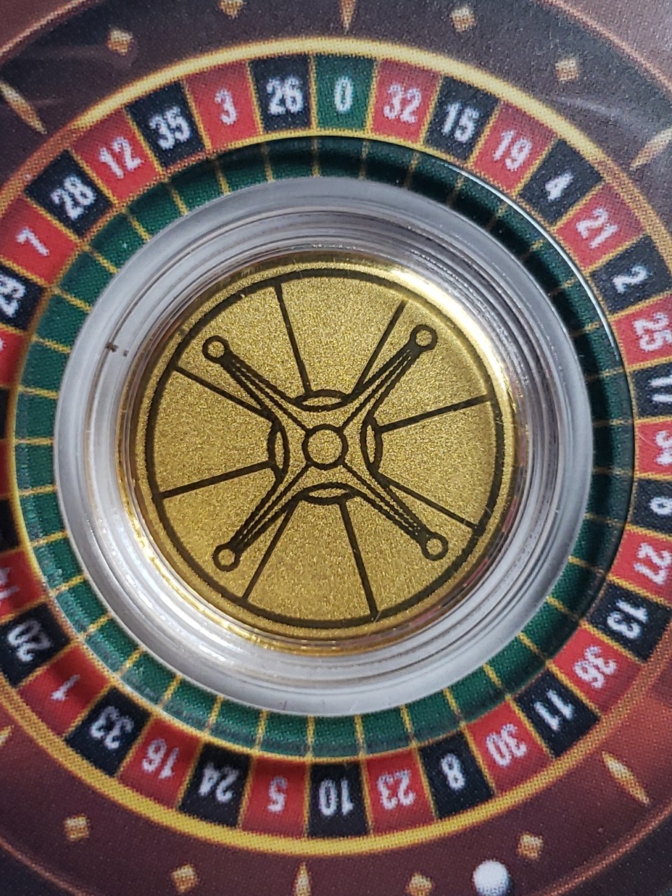 Roulette 1/1000 oz Gold Round In Card. Mintage 10,000