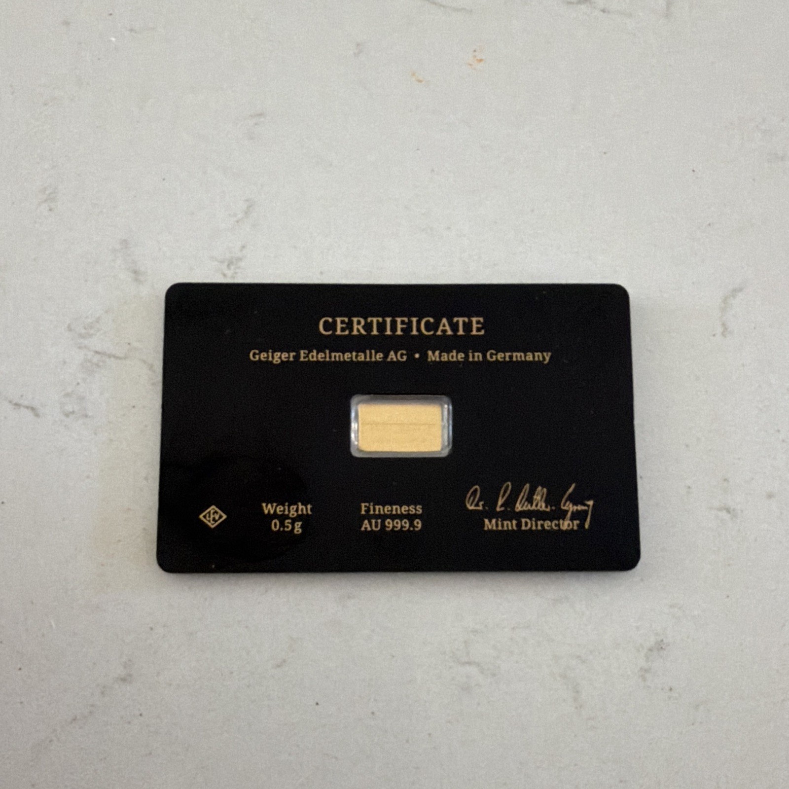 Geiger Edelmetalle AG 0.5g .9999 Gold Bar Assay Card Certificate Schloss