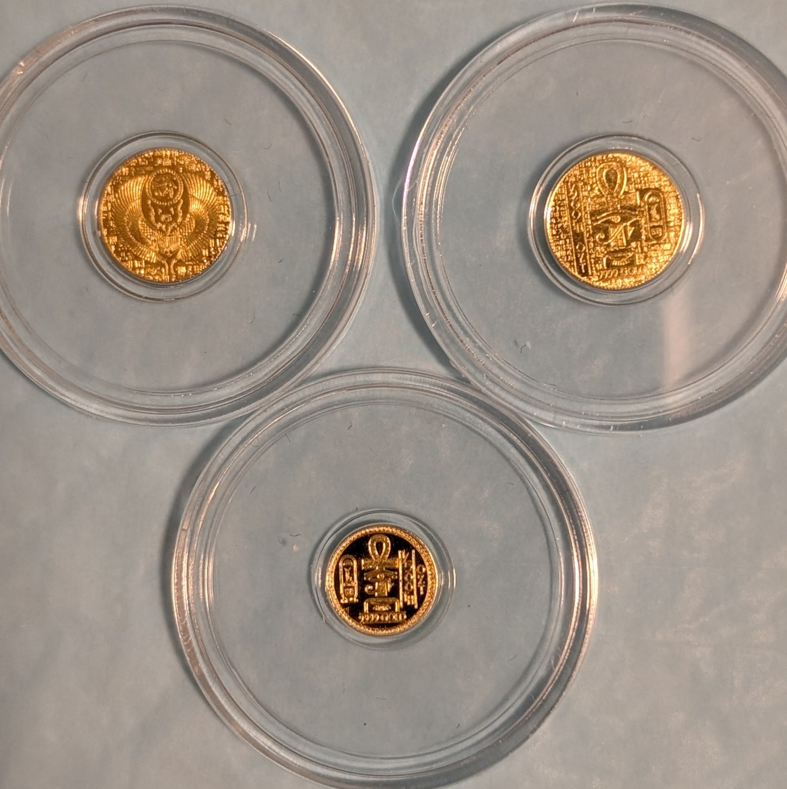 Lot of 3 .9999Pure Gold Rounds-2 1/200 oz Egyptian Scarab & 1 1/500 oz Eye of Ra