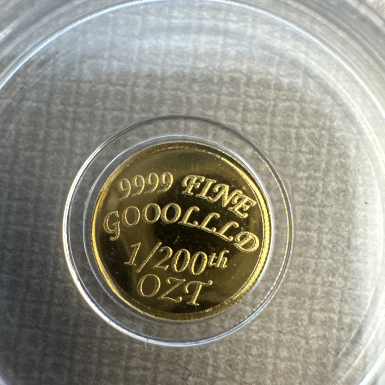 The Coin Shack 1/200th oz .9999 Fine Gold Round In Plastic Capsule