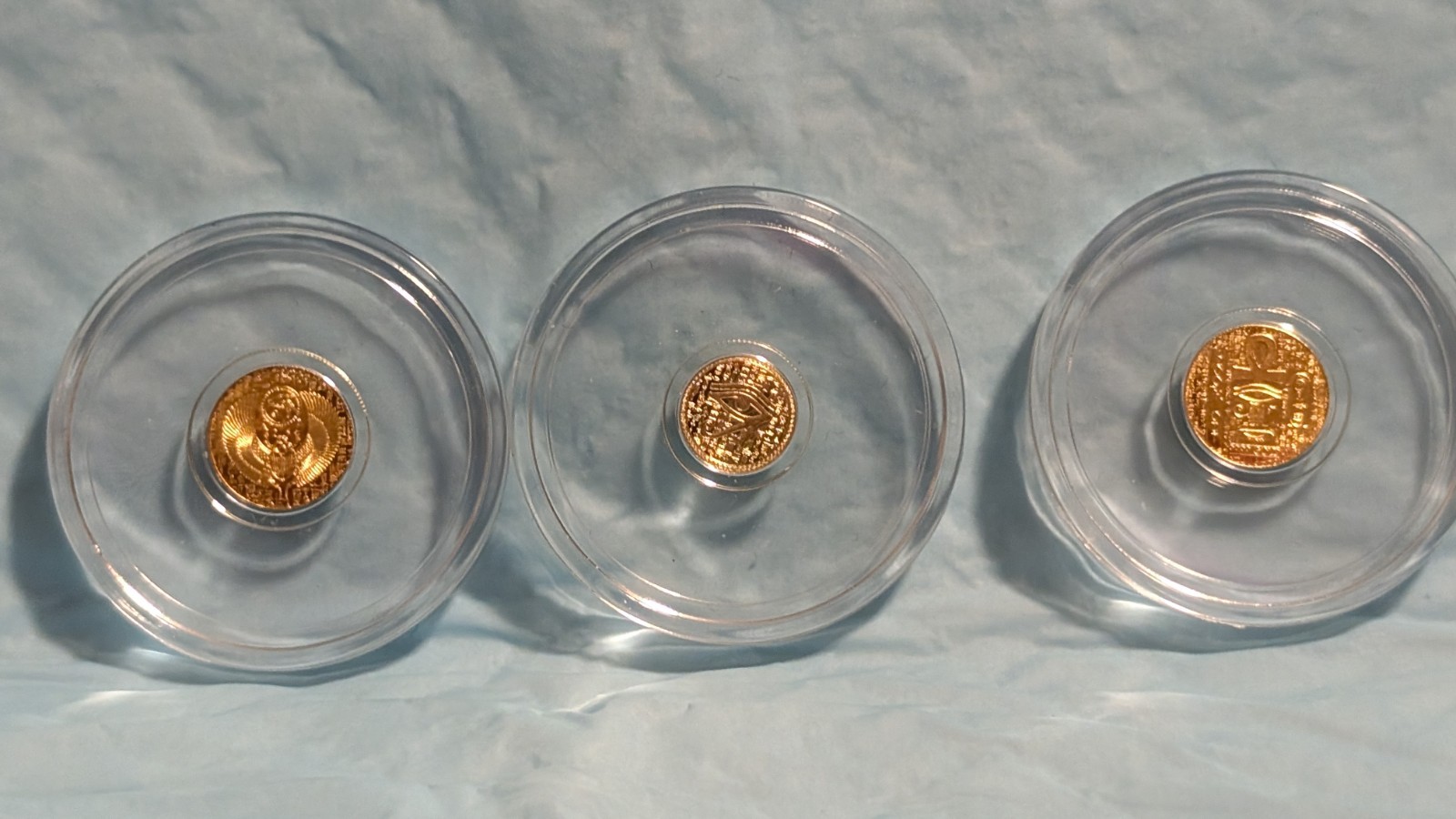 Lot of 3 .9999Pure Gold Rounds-2 1/200 oz Egyptian Scarab & 1 1/500 oz Eye of Ra
