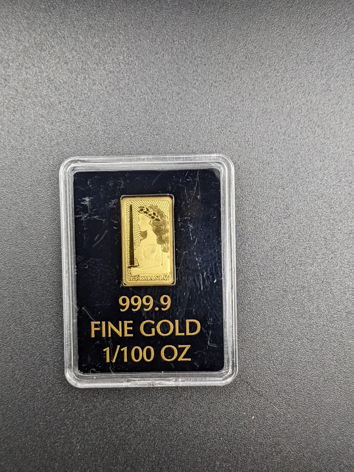 Germania Mint 1/100 oz Gold Bar in Plastic Capsule