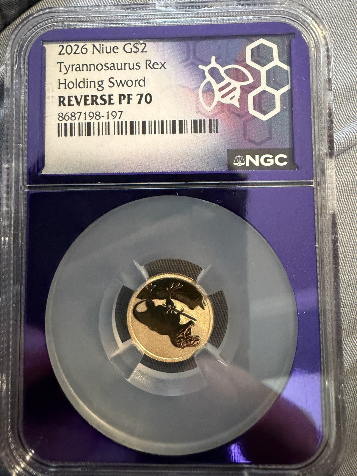 2026 Niue G$2 Gold Tyrannosaurus Rex Holding Sword 2 Gram Gold REVERSE PF 70