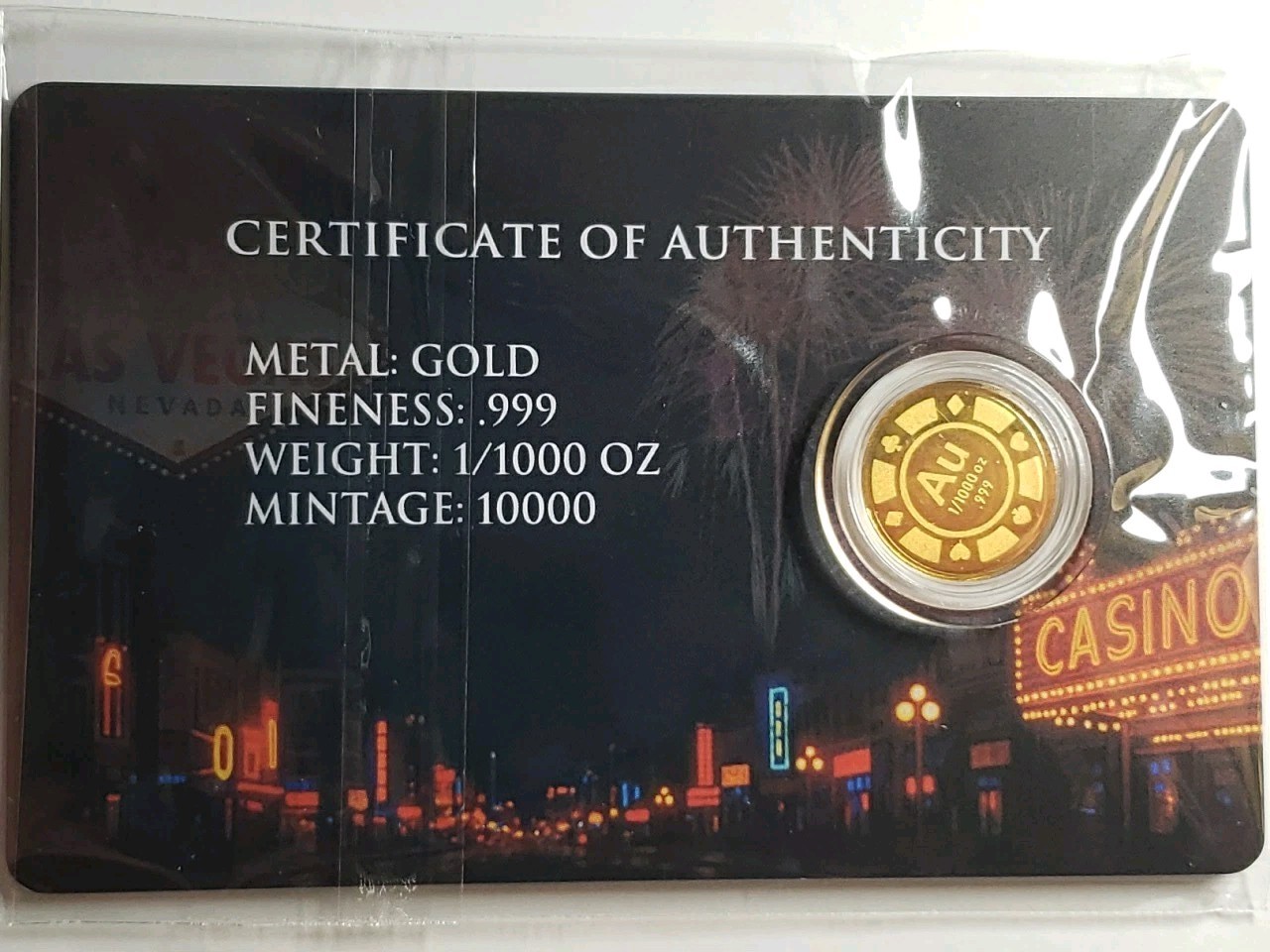 Roulette 1/1000 oz Gold Round In Card. Mintage 10,000