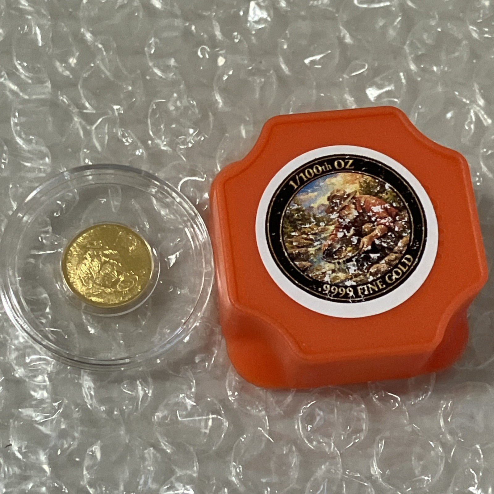 1/100th Troy ounce MONARCH .9999 Fine Gold Prospector Round in Clear Capsule