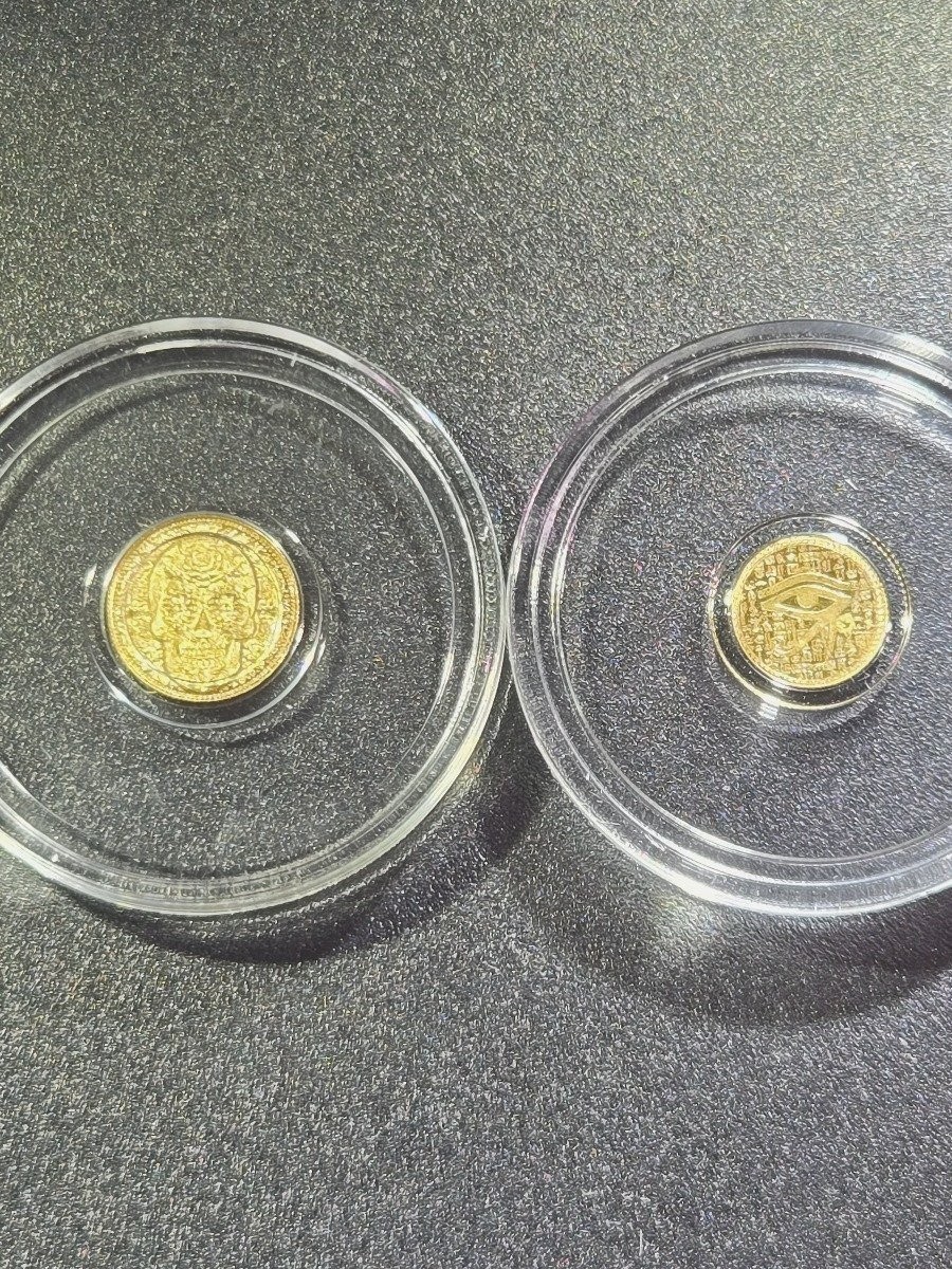 2 Fractional Gold Rounds: 1/200 oz Dia de los Muertos & 1/500 oz Eye of Horus